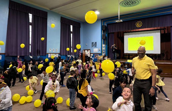  Students are celebrating with Principal Coleman.